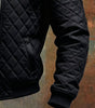 MAISON CLÉMENT PARIS™ | BLACK QUILTED JACKET WITH LEATHER SHOULDERS